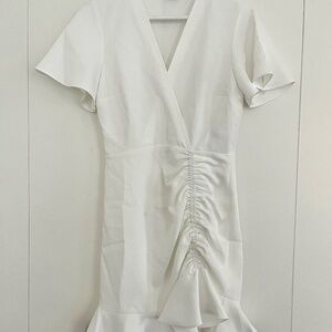 White mini Sandro dress with tags